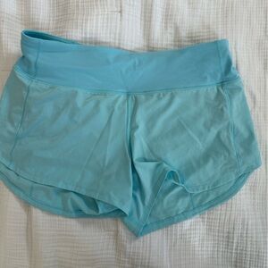 Lululemon Athletica Speed up running shorts cyan blue sz 8 mid rise 4” inseam